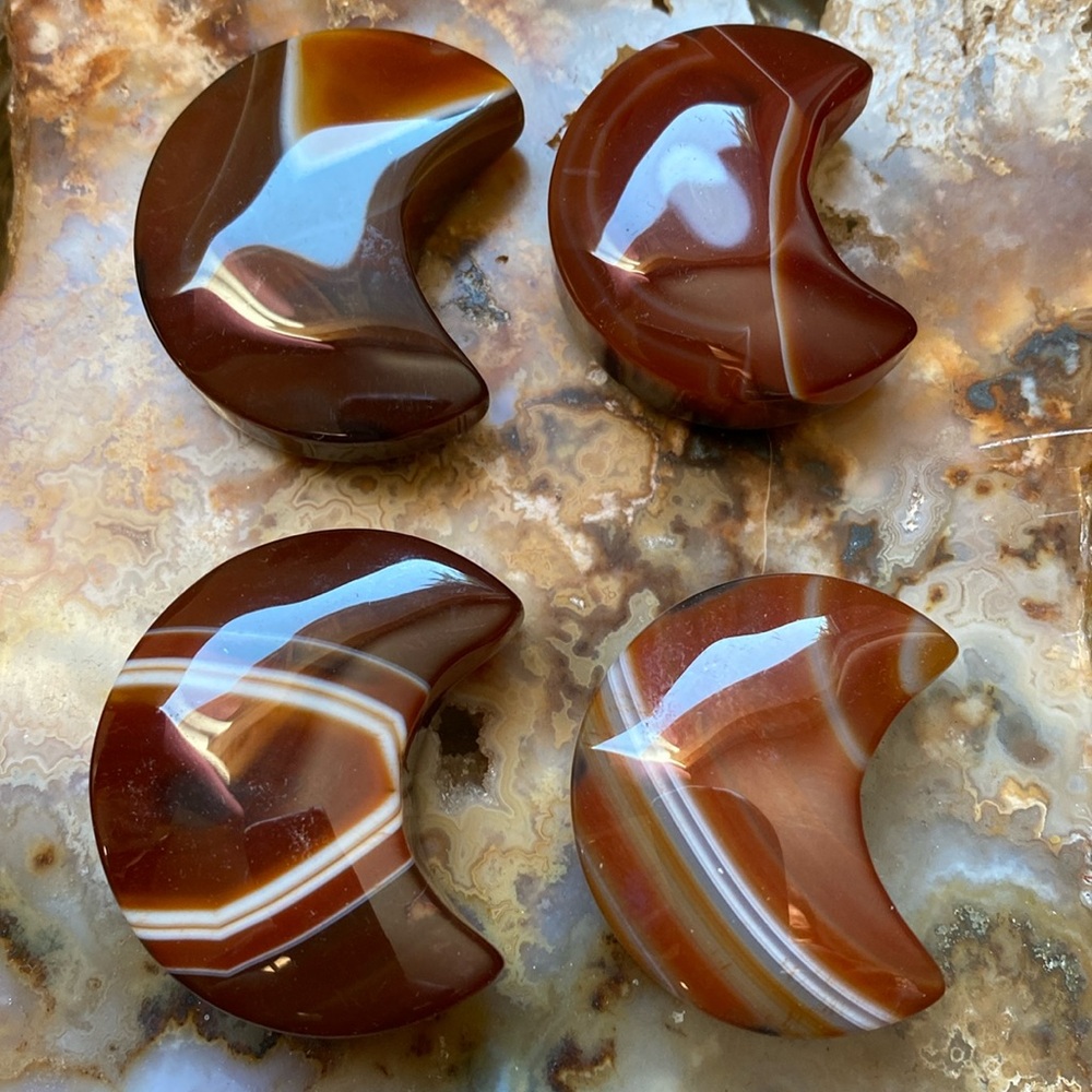 One carnelian moon carving
